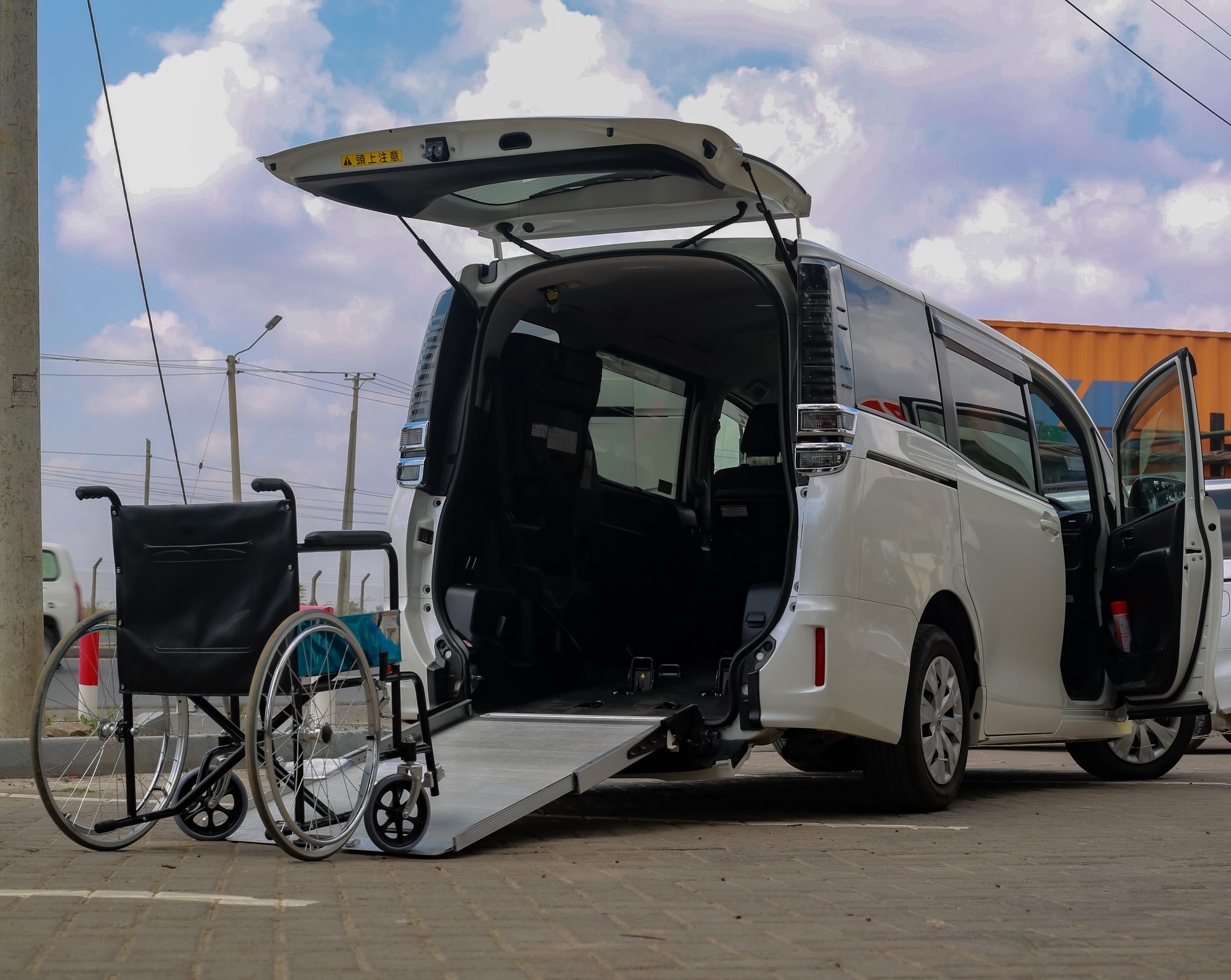 Toyota Voxy with rear ramp lowered and space for two wheelchairs