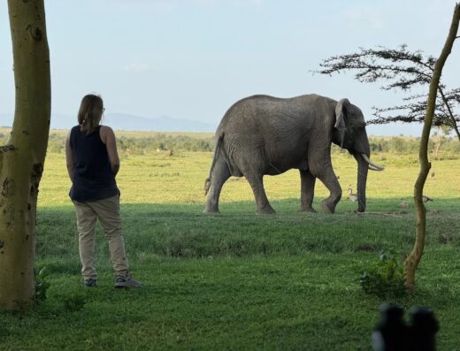 Guest with elephant Ol Pejeta