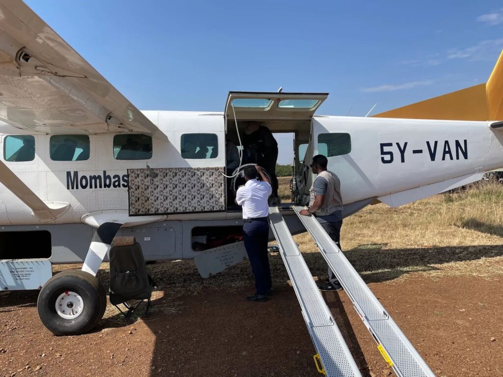 Ramp boarding onto a light aircraft for the flight from the Maasai Mara to Tsavo